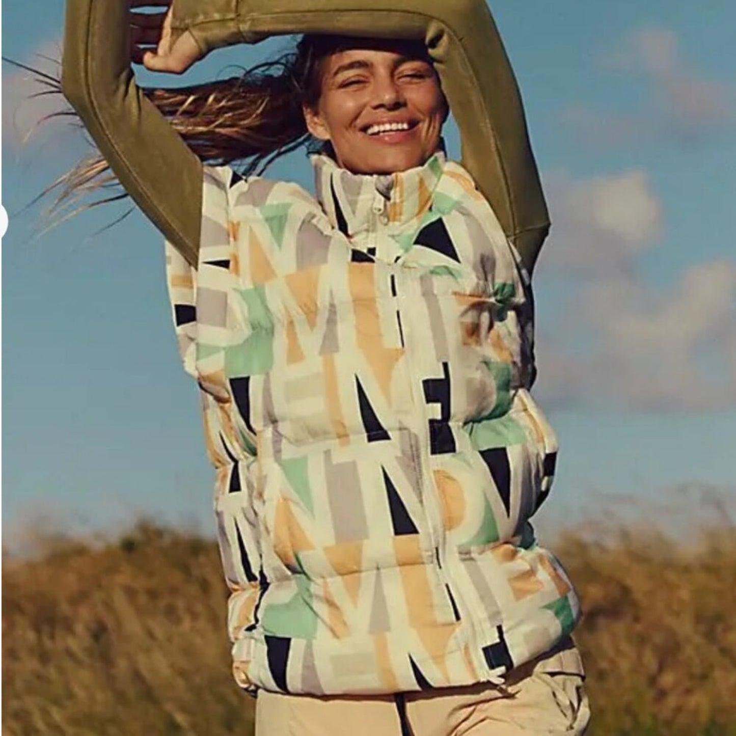 Free People In A Bubble Printed Puffer Vest in Blocked Logo