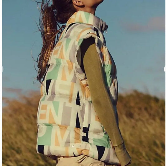 Free People In A Bubble Printed Puffer Vest in Blocked Logo