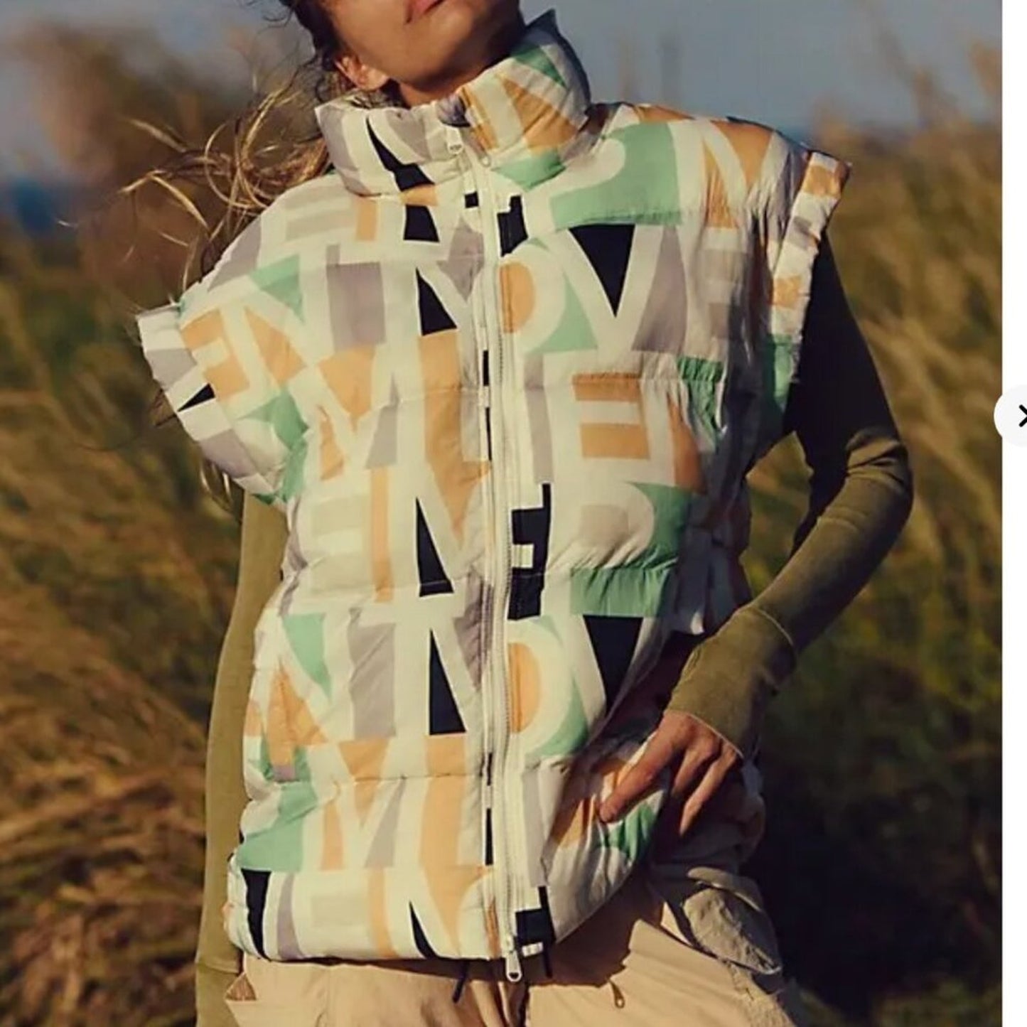 Free People In A Bubble Printed Puffer Vest in Blocked Logo